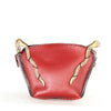 Handmade purse made of 100% genuine leather with a short shoulder strap made of leather and gold brass. 