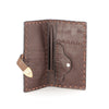 Handmade passport wallet made of 100% genuine leather embossed with triangular patterns.
