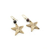 Handmade star shaped earrings made of gold brass. 